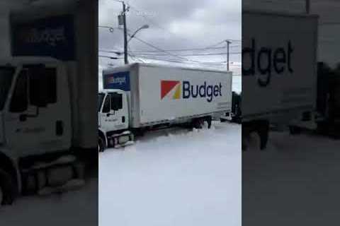 Police use armored vehicle to remove cars stranded in Buffalo snow