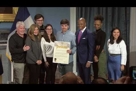 Hero teacher honored after intervening in subway attack