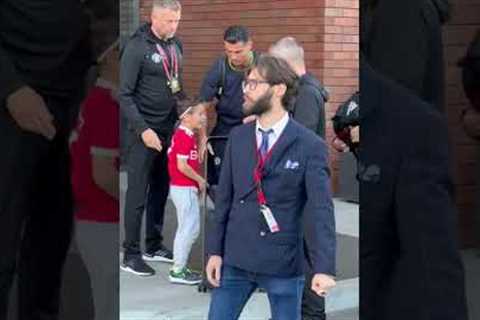 Cristiano Ronaldo hugs little boy who breaks through crowds