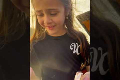 Girl reacts to holding freshly-hatched chicks and hatching egg