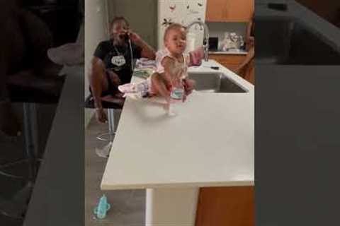 Hilarious! One-year-old girl lands bottle flip TWICE