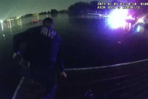 BODY CAM: Police save woman who crashed car into lake