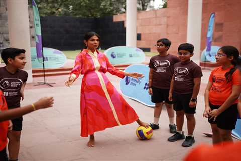 Rishi Sunak's wife Akshata shows off her footie skills playing barefoot with kids at G20 summit in..