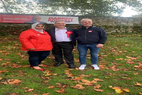 Fury as Labour candidate criticized for using gravestones to hang election campaign banner