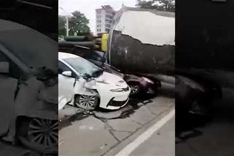 Massive cement pipe crushes parked cars