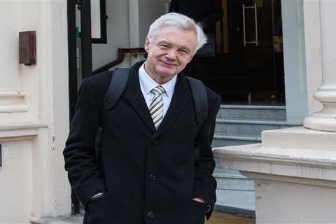 Tory MP David Davis saves homeless man from violent attack yards from Parliament before giving him..