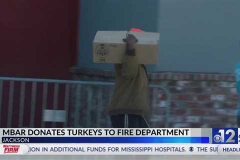 M-Bar donates turkeys to fire department