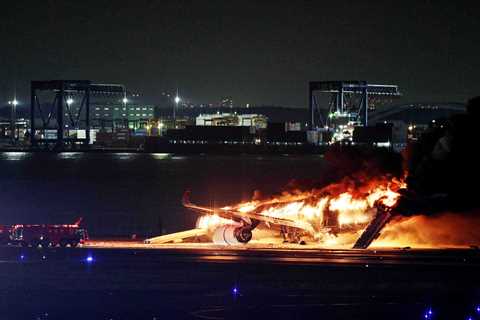 Pics: Plane In Flames At Tokyo Airport After Colliding With Another Aircraft