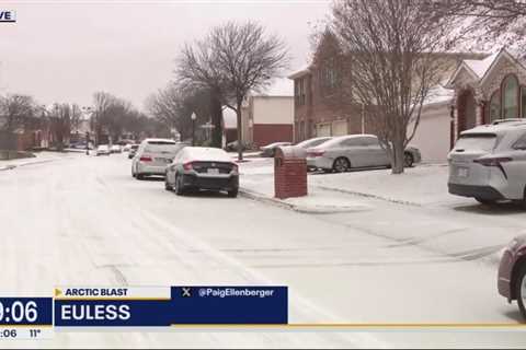 Tarrant County streets covered in a layer of snow