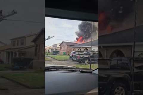 Firefighters escape as burning roof collapsed