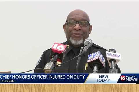 JPD officer honored after being hit by vehicle