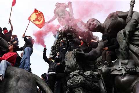 Paris rocked by RIOTS as cops charge protesters with batons and blast them with tear gas months..