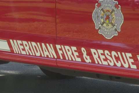 Meridian Police Department faces off against the Meridian Fire Department in a game of kickball