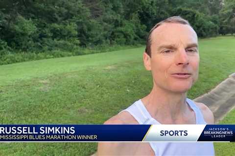 Sports anchor Bradley Davis runs with marathon champ