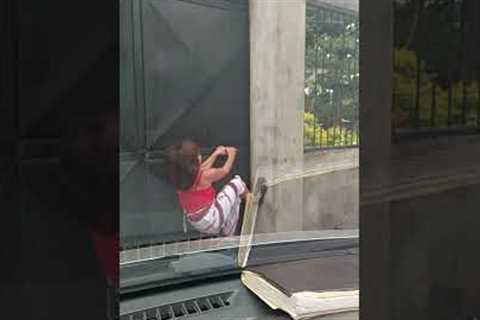 Independent Girl Skillfully Opens Gate